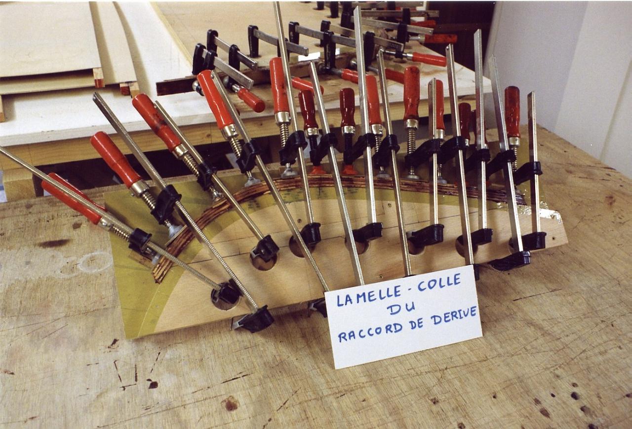 Lamellé-collé de raccord de dérive.
